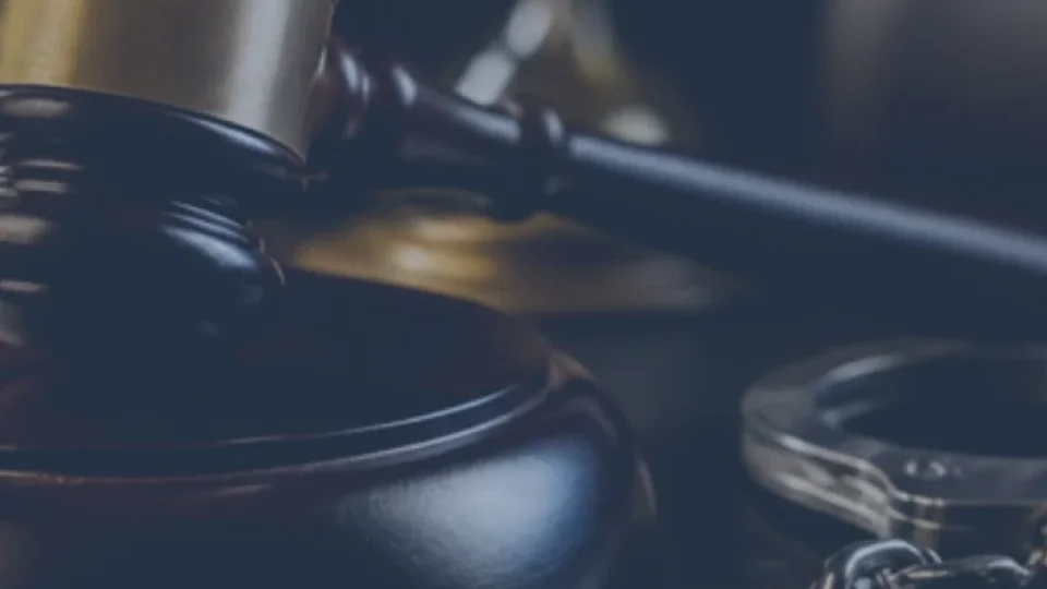 Defense table facing judge bench، bail hearing stage — is bail release sought